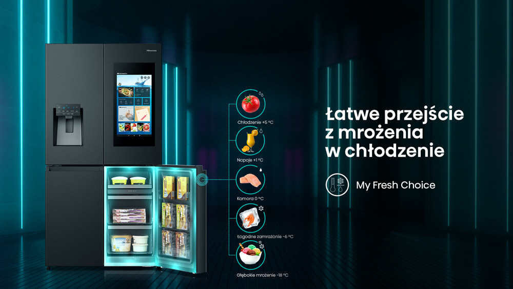 Czarna lodówka z ekranem TFT i kostkarką, otwarta dolna część z widocznymi produktami spożywczymi. Obok lodówki znajduje się tekst: \'Łatwe przejście z mrożenia w chłodzenie My Fresh Choice\'.