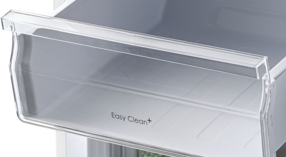 Przezroczysta szuflada lodówki z napisem \'Easy Clean+\'.