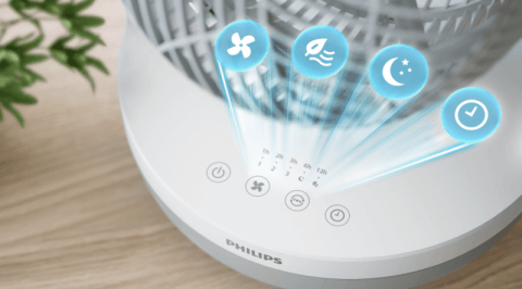 Na zdjęciu widoczna jest podstawa wentylatora z logo PHILIPS oraz przyciskami dotykowymi. Nad przyciskami unoszą się ikony symbolizujące różne funkcje urządzenia.