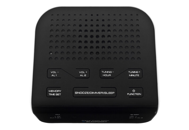 Czarny radiobudzik z kilkoma przyciskami na górze, w tym \'VOL - AL 1\', \'VOL + AL 2\', \'TUNING - HOUR\', \'TUNING + MINUTE\', \'MEMORY TIME SET\', \'SNOOZE/DIMMER/SLEEP\' i \'FUNCTION\'. Widoczne są również otwory głośnika oraz logo \'BLAUPUNKT\' na przedniej części urządzenia.