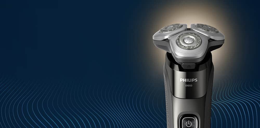 Golarka z trzema okrągłymi głowicami tnącymi, na uchwycie widoczne jest logo \'PHILIPS\' oraz oznaczenie \'i9000\'.