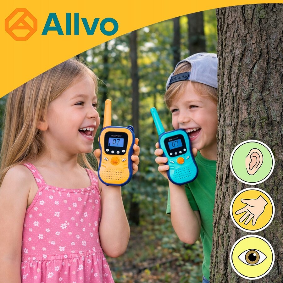 Dwoje dzieci trzyma walkie talkie z wyświetlaczem LCD, jedno w kolorze żółtym, drugie niebieskim. W górnym rogu widoczne jest logo \'Allvo\'.