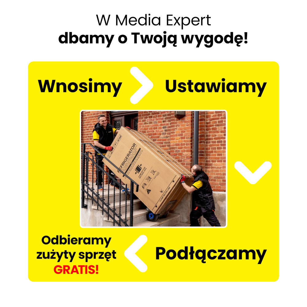 Na obrazie widoczni są dwaj mężczyźni wnoszący karton z napisem \'REFRIGERATOR\' po schodach. Tekst na obrazie: \'W Media Expert dbamy o Twoją wygodę! Wnosimy data-genbyai=