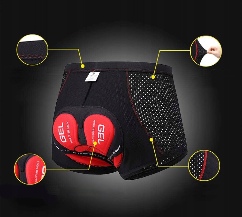 Czarne spodenki rowerowe z czerwonymi wkładkami żelowymi oznaczonymi napisem \'GEL ANTI-SHOCK\'. Materiał spodenek jest perforowany, a szwy są wzmocnione.