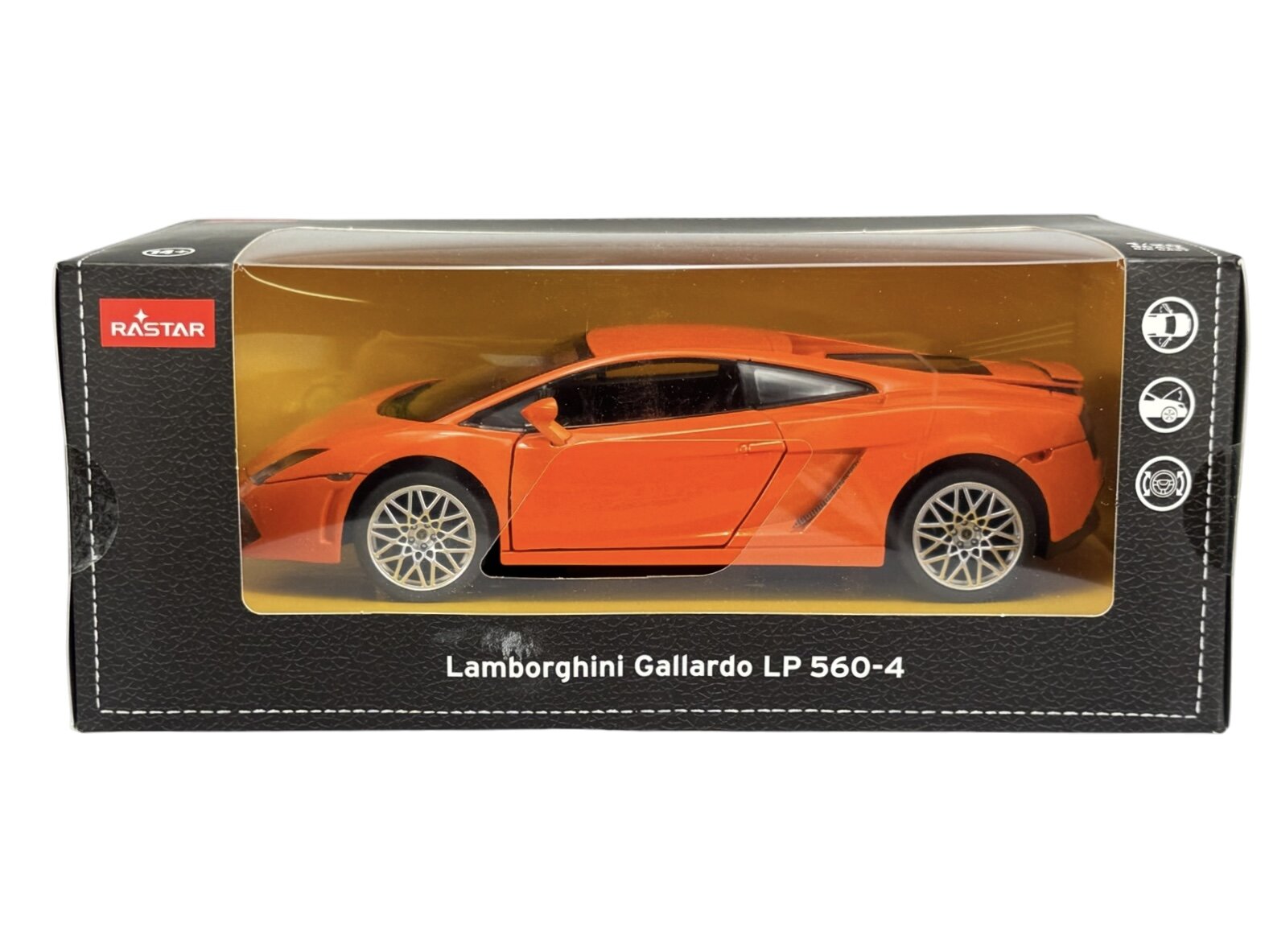 Pomarańczowy model samochodu Lamborghini Gallardo LP 560-4 w skali 1:20 znajduje się w przezroczystym opakowaniu z logo Rastar. Na opakowaniu widnieje napis \'Lamborghini Gallardo LP 560-4\'.