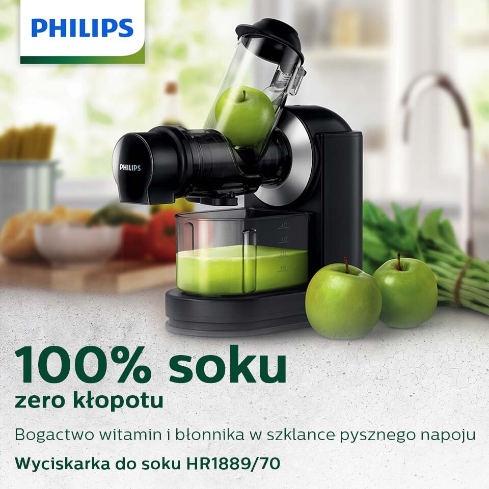 Na obrazie znajduje się wyciskarka wolnoobrotowa z logo PHILIPS, w której znajduje się zielone jabłko. Widoczny jest tekst: \'100% soku, zero kłopotu, Bogactwo witamin i błonnika w szklance pysznego napoju, Wyciskarka do soku HR1889/70\'.