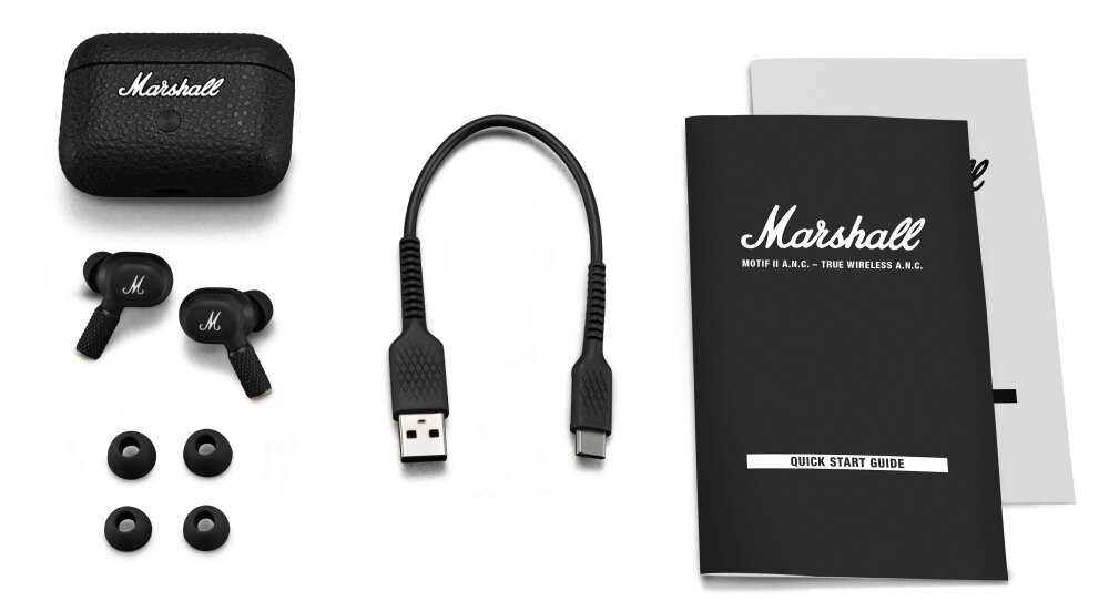 Na obrazie widoczne są czarne słuchawki dokanałowe z logo \'M\', etui z napisem \'Marshall\', kabel USB oraz instrukcja obsługi z napisem \'Marshall MOTIF II A.N.C. - TRUE WIRELESS A.N.C. QUICK START GUIDE\'.