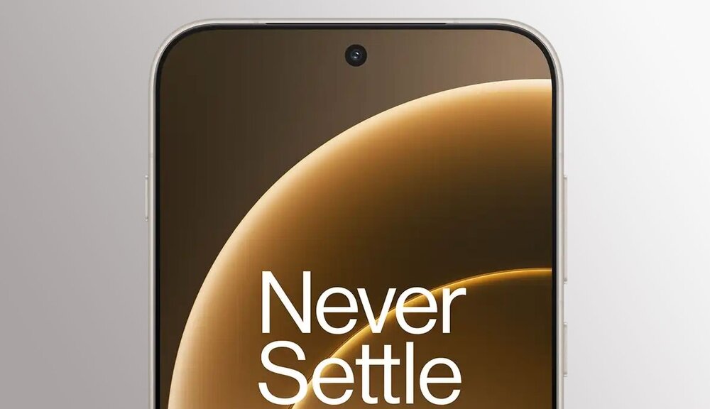 Na obrazie widoczny jest fragment smartfona z wyświetlaczem, na którym znajduje się napis \'Never Settle\'.