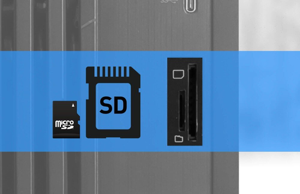 Obraz przedstawia złącze na komputerze z ikonami kart microSD i SD na niebieskim tle. Obok znajduje się port na karty pamięci.