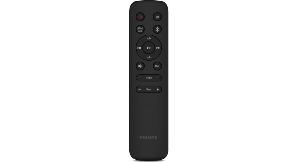 Czarny pilot z przyciskami do regulacji głośności, odtwarzania, basów i trebli, z widocznym logo PHILIPS na dole.
