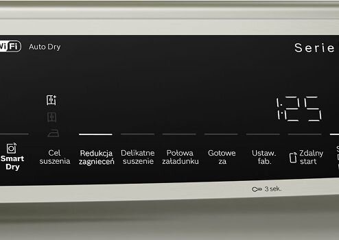 Panel sterowania suszarki z wyświetlaczem pokazującym czas 1:25 oraz ikonami i napisami: Smart Dry, Cel suszenia, Redukcja zagnieceń, Delikatne suszenie, Połowa załadunku, Gotowe za, Ustaw. fab., Zdalny start.