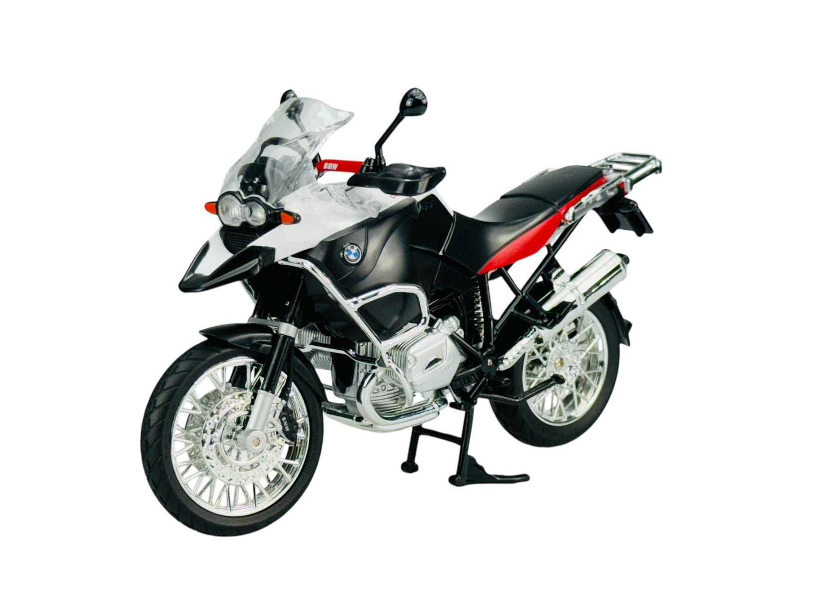 Model motocykla w kolorze białym z czarnymi i czerwonymi elementami, z widocznym logo producenta. Motocykl stoi na przezroczystym tle.
