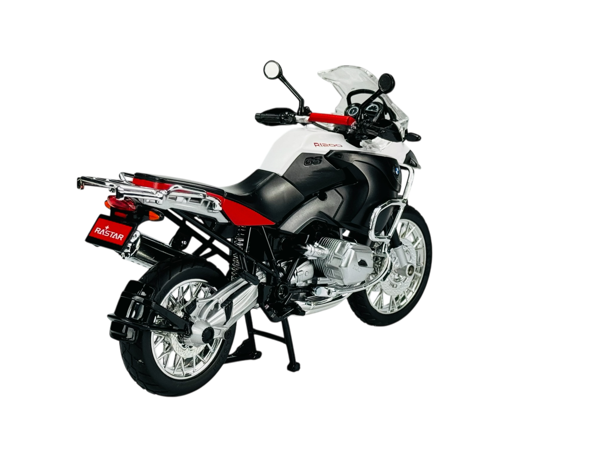 Model motocykla w kolorze białym z czarnymi i czerwonymi elementami, z widocznym logo \'Rastar\' na tablicy rejestracyjnej. Motocykl ma szczegółowe elementy, takie jak lusterka i koła z szprychami.