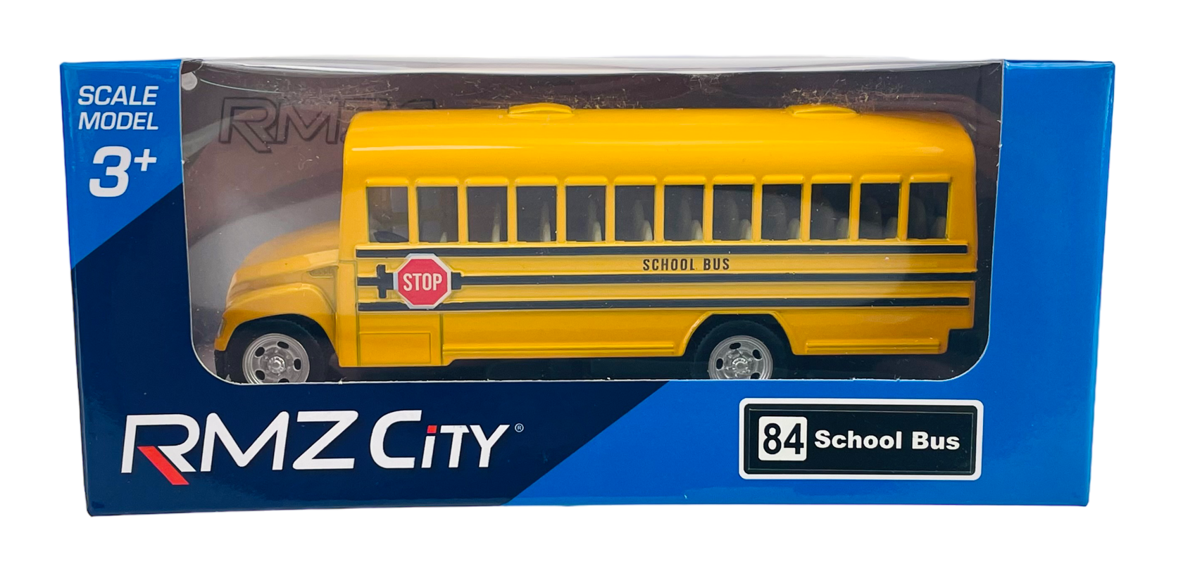 Żółty model autobusu szkolnego w opakowaniu z napisem \'RMZ City\' i oznaczeniem \'84 School Bus\'. Na opakowaniu widnieje również napis \'SCALE MODEL 3+\'.