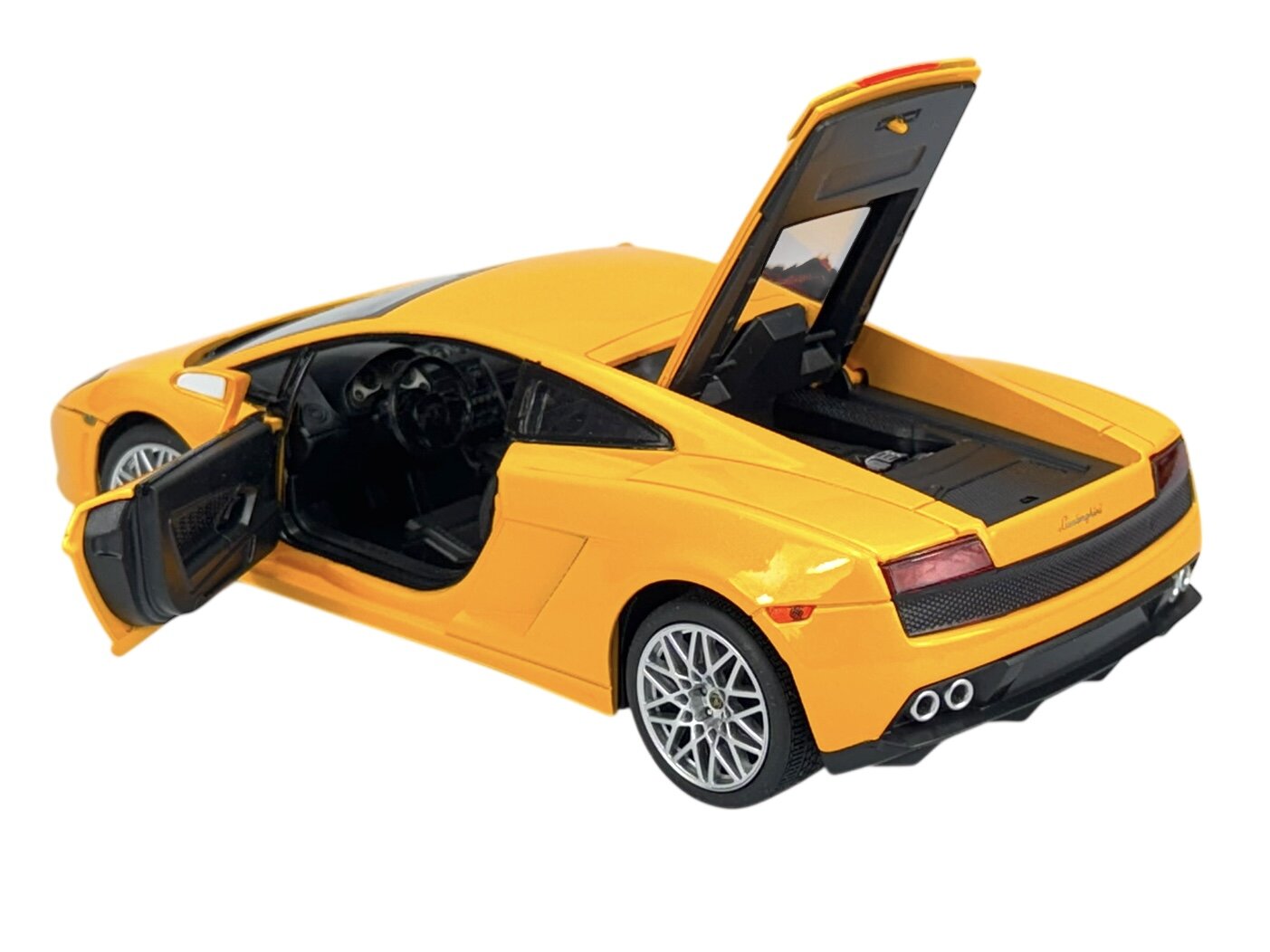 Żółty model samochodu sportowego z otwartymi drzwiami i klapą bagażnika. Na tylnej części widoczny napis \'Lamborghini\'.