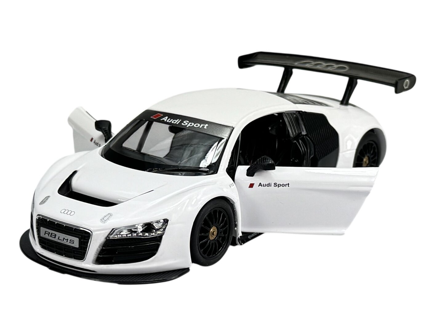 Biały model samochodu wyścigowego z otwartymi drzwiami i widocznym napisem \'Audi Sport\' na przedniej szybie. Na masce znajduje się logo Audi, a na tablicy rejestracyjnej napis \'R8 LMS\'.