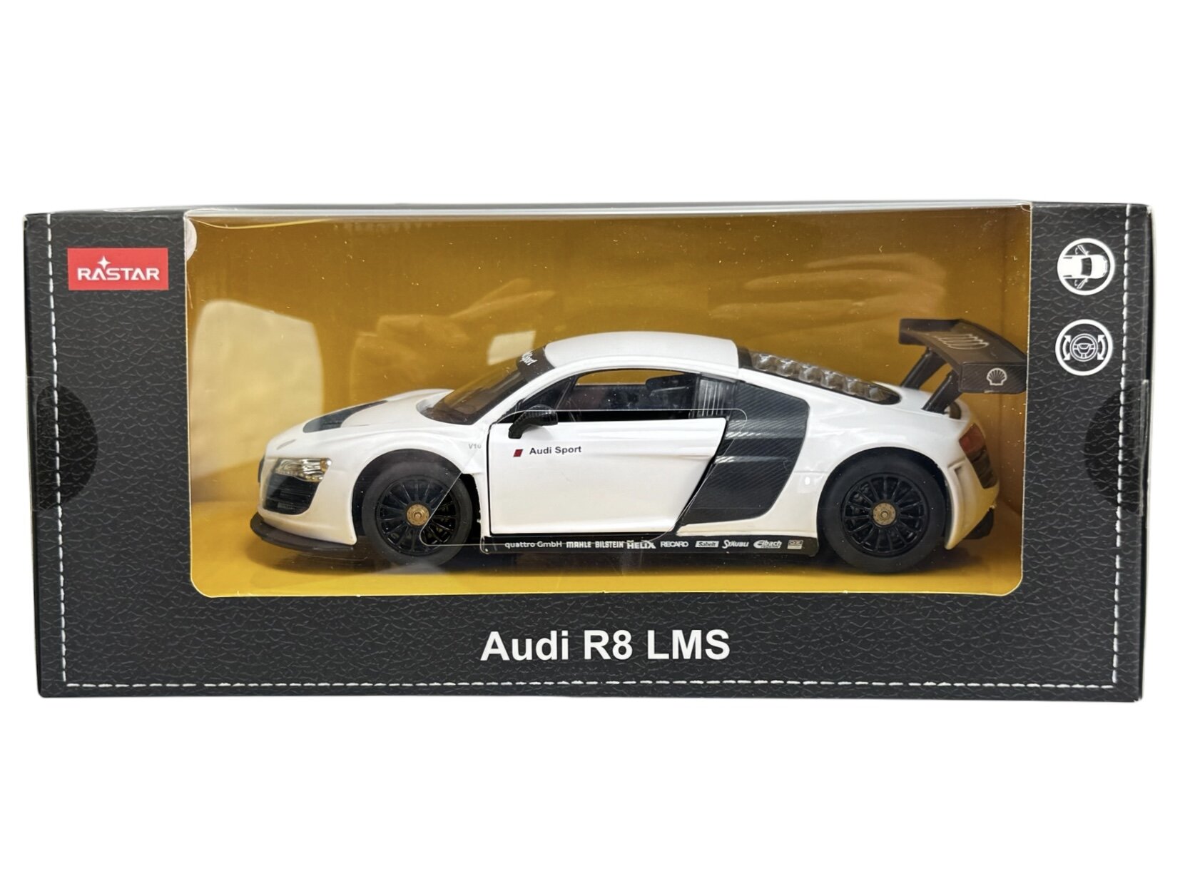 Model samochodu Audi R8 LMS w kolorze białym znajduje się w przezroczystym opakowaniu z logo Rastar. Na opakowaniu widoczny jest napis \'Audi R8 LMS\'.
