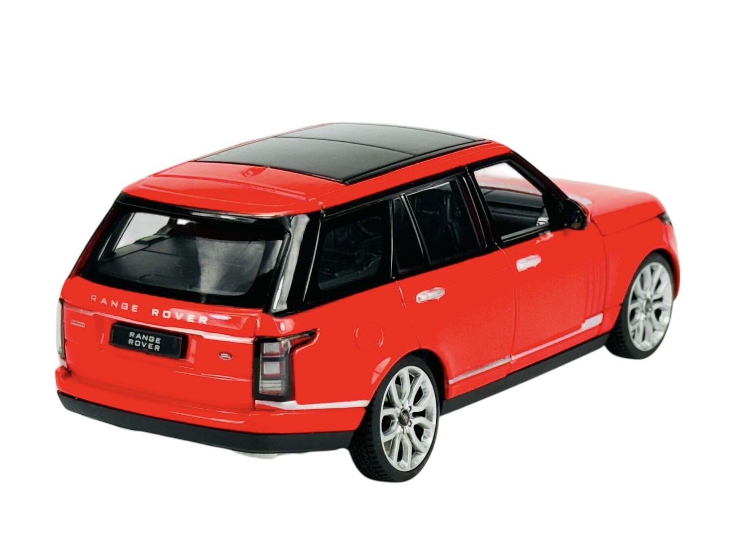 Czerwony model samochodu Range Rover w skali 1:24 z czarnym dachem i srebrnymi felgami. Na tylnej części pojazdu widoczny jest napis \'RANGE ROVER\'.