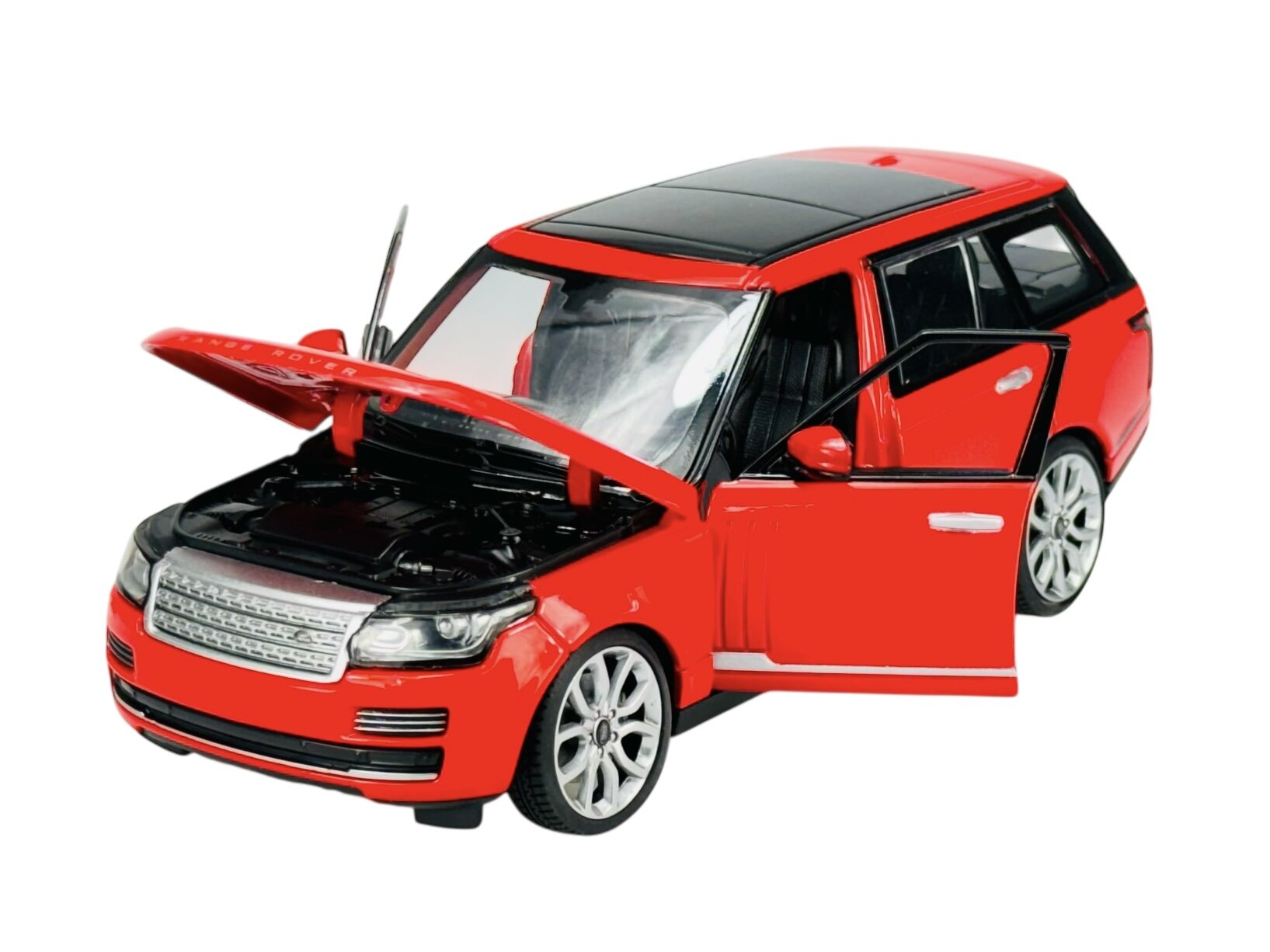 Czerwony model samochodu Range Rover z otwartą maską i drzwiami, wykonany w skali 1:24. Samochód ma czarny dach i srebrne felgi.