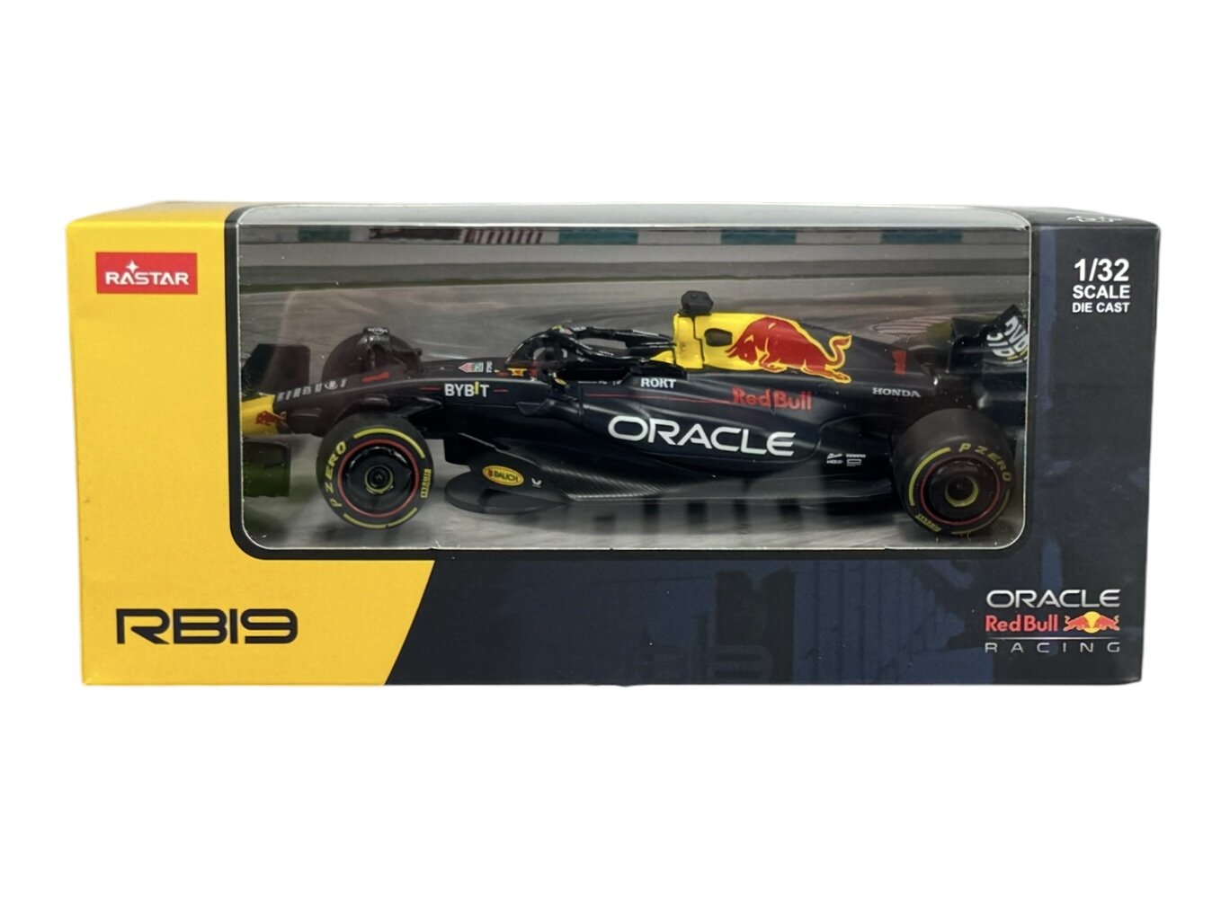 Model samochodu wyścigowego w skali 1/32 w opakowaniu z przezroczystym frontem, z widocznymi napisami \'ORACLE\', \'Red Bull Racing\' oraz logo \'RASTAR\'.