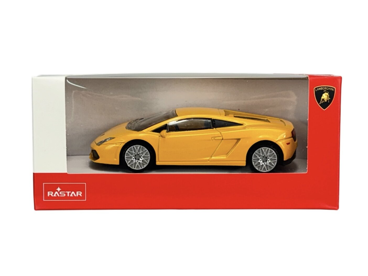 Model samochodu w skali 1:43 w kolorze żółtym, umieszczony w pudełku z przezroczystym frontem. Na pudełku widoczne są logo \'Rastar\' oraz \'Lamborghini\'.