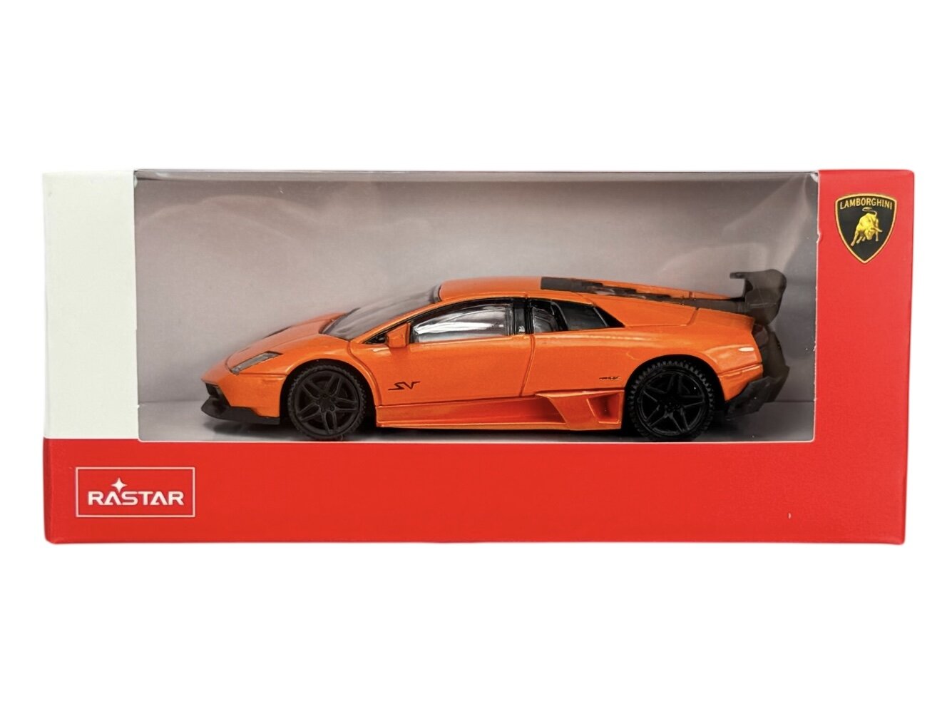Model samochodu w skali 1:43 w kolorze pomarańczowym, umieszczony w pudełku z przezroczystym frontem. Na opakowaniu widoczne są loga \'RASTAR\' i \'Lamborghini\'.