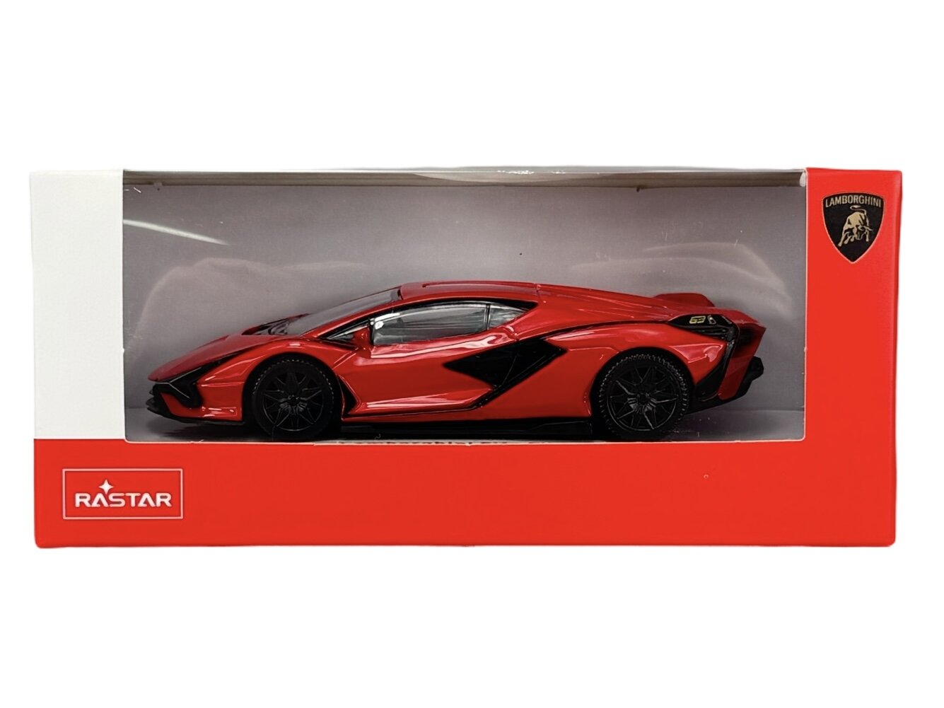 Model samochodu w skali 1:43 w kolorze czerwonym, umieszczony w pudełku z przezroczystym frontem. Na opakowaniu widoczne są logotypy \'RASTAR\' i \'Lamborghini\'.