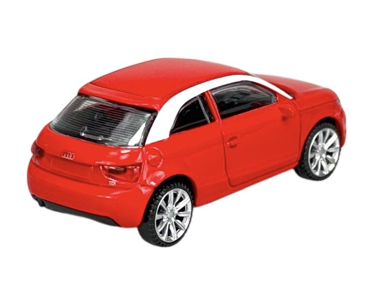Czerwony model samochodu z białym dachem, przedstawiający Audi A1 w skali 1:43. Na tylnej części widoczne jest logo Audi oraz oznaczenie TDI.