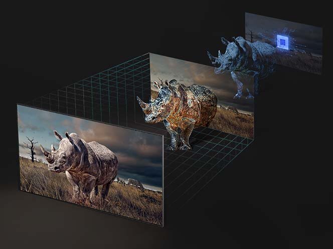 Obraz przedstawia nosorożca na sawannie, widocznego na trzech różnych ekranach, z efektem głębi i siatką 3D. Tło jest ciemne, a nosorożec jest oświetlony, co podkreśla szczegóły jego skóry.