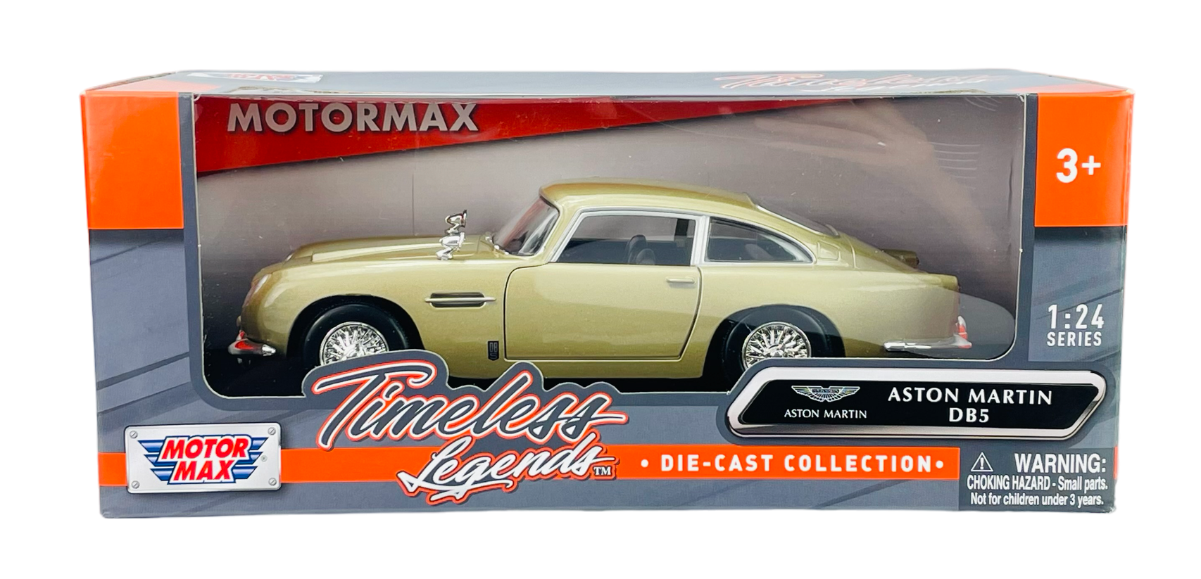 Model samochodu Aston Martin DB5 w złotym kolorze w opakowaniu z napisem \'Timeless Legends\' i logo \'Motormax\'. Opakowanie zawiera ostrzeżenie: \'WARNING: CHOKING HAZARD - Small parts. Not for children under 3 years.\'