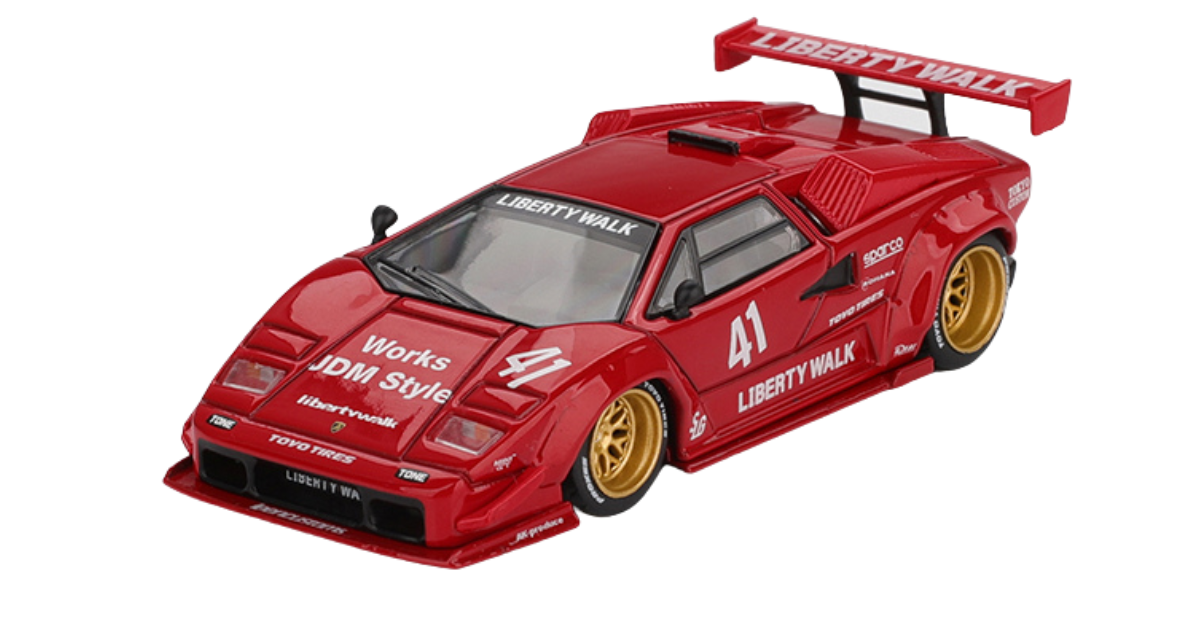 Czerwony model samochodu sportowego z numerem 41 i napisami \'LIBERTY WALK\', \'Works JDM Style\', oraz \'TOYO TIRES\'. Samochód ma złote felgi i duży tylny spojler z napisem \'LIBERTY WALK\'.