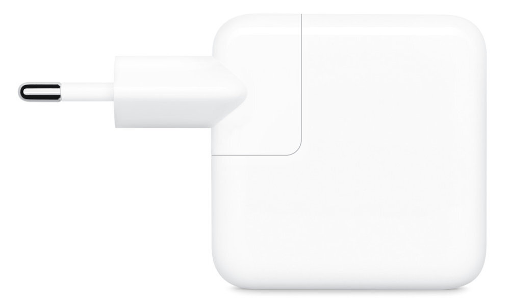 Biała ładowarka sieciowa z wtyczką i gniazdem USB-C, o prostokątnym kształcie z zaokrąglonymi krawędziami.