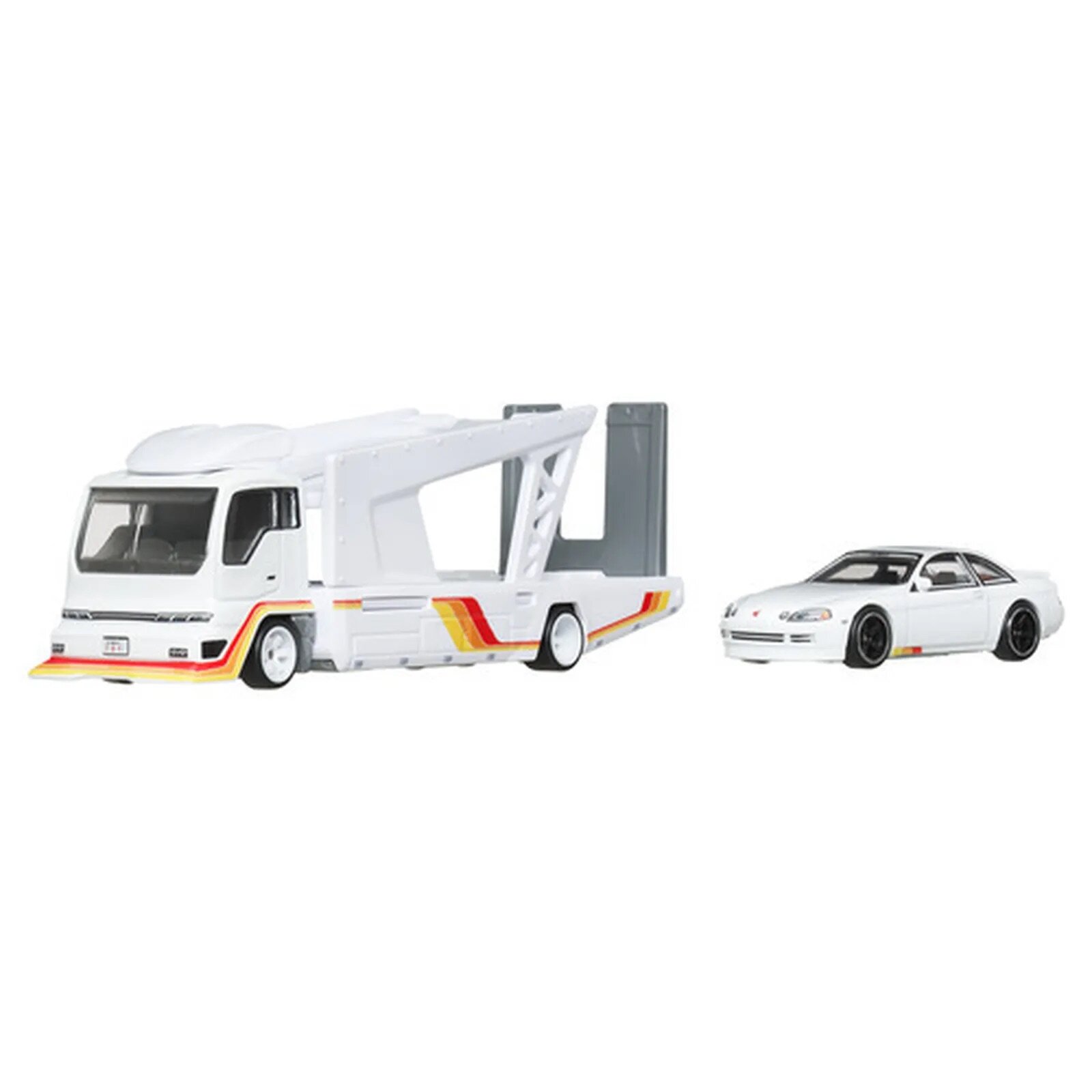 Na obrazie widoczne są dwa modele pojazdów: biały transporter z czerwono-żółtymi paskami oraz biały samochód sportowy. Oba modele są wykonane z metalu i mają szczegółowe wykończenia.