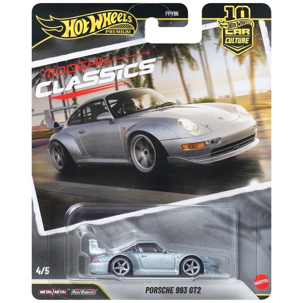 Opakowanie z modelem samochodu Hot Wheels Premium, przedstawiające srebrny model Porsche 993 GT2. Na opakowaniu widnieje napis \'MODERN CLASSICS\' oraz logo \'Mattel\'.