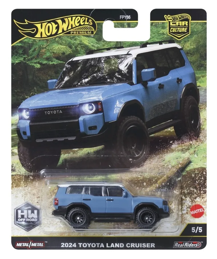 Opakowanie z modelem samochodu Hot Wheels Premium, przedstawiające niebieski pojazd terenowy z napisem \'2024 Toyota Land Cruiser\'. Widoczne są logotypy \'HW Off Road\', \'Metal/Metal\', \'Real Riders\' oraz \'Mattel\'.