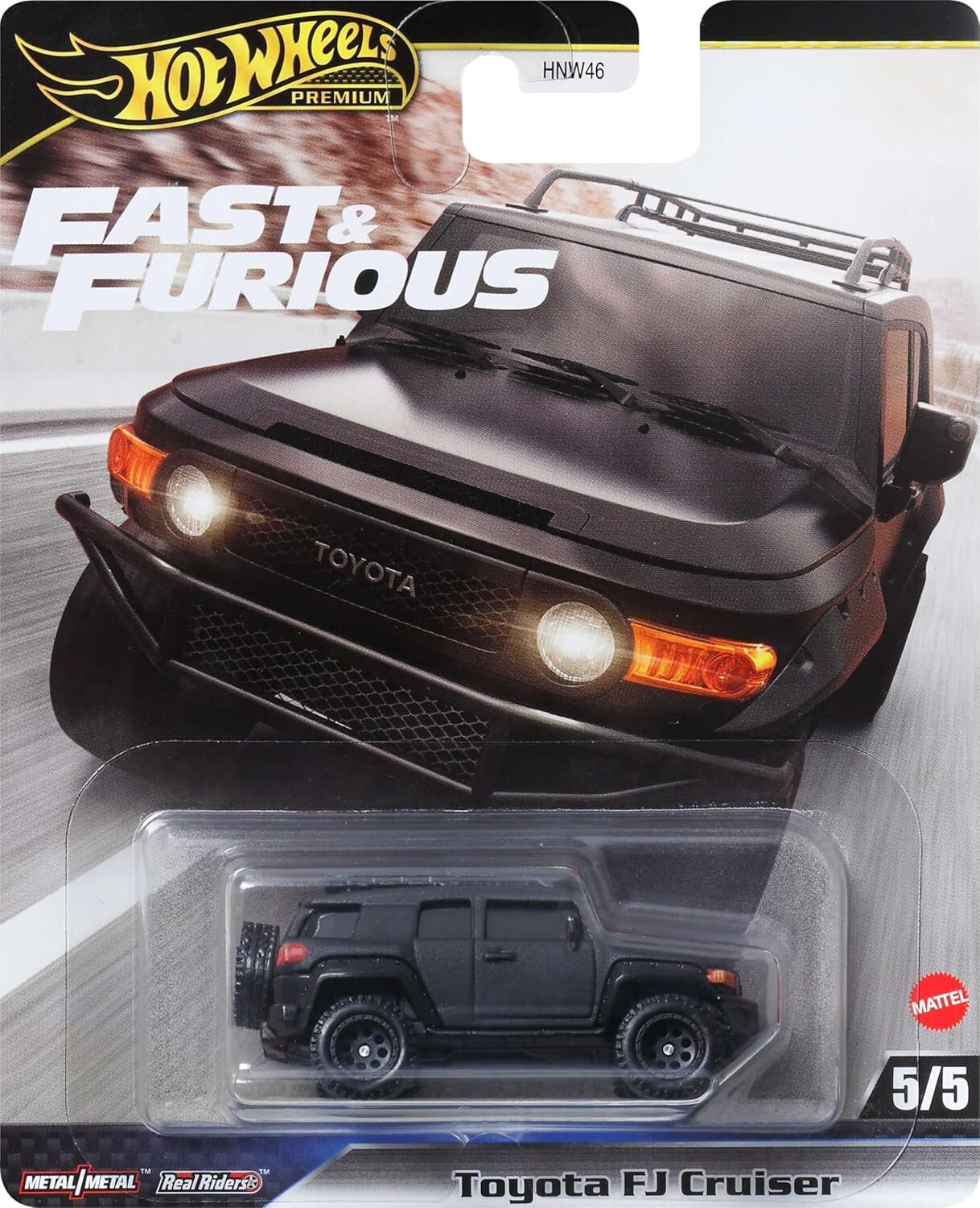 Opakowanie z modelem samochodu Hot Wheels Premium, przedstawiające czarny pojazd Toyota FJ Cruiser. Na opakowaniu widnieje napis \'Fast & Furious\' oraz logo \'Mattel\'.