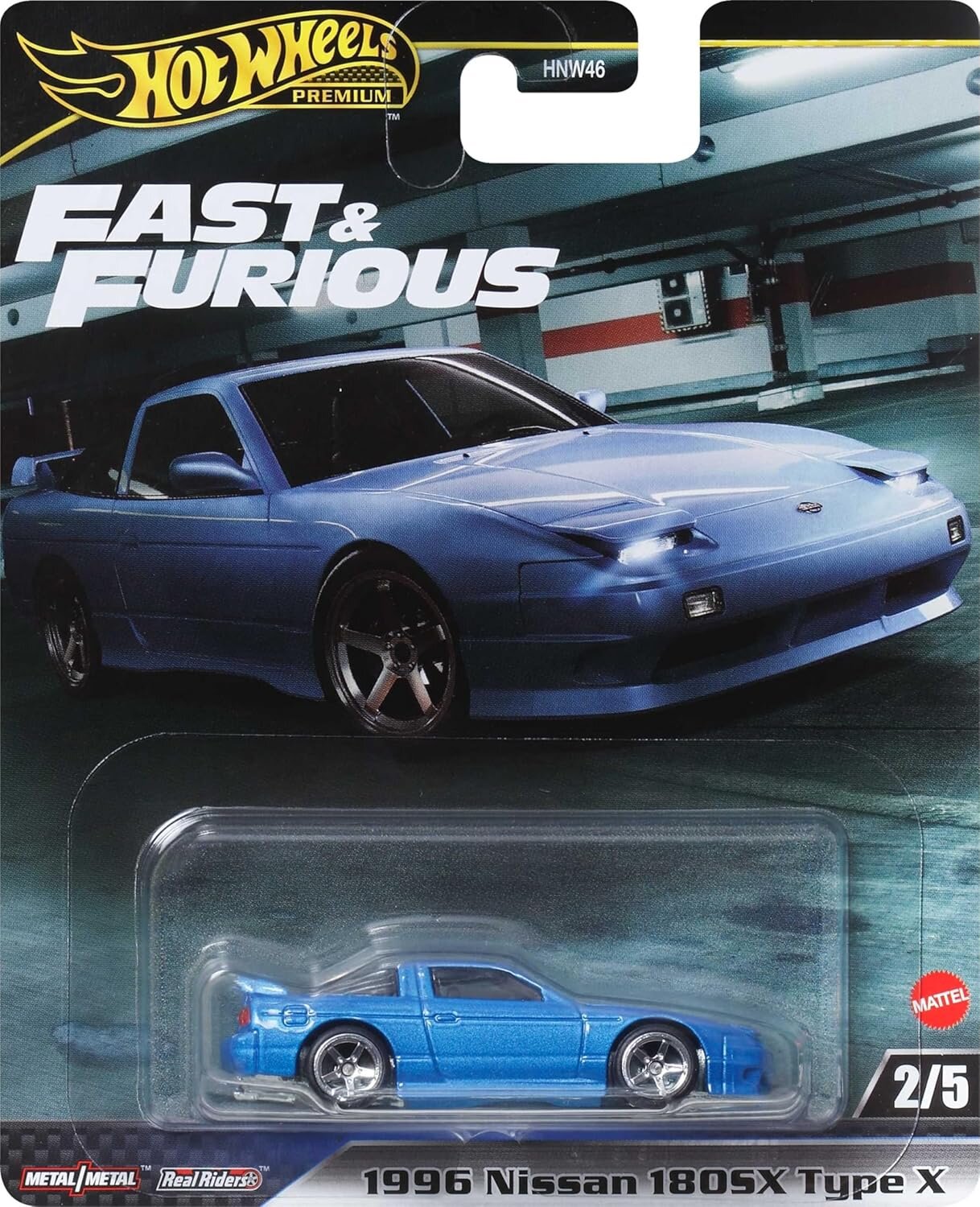 Opakowanie z modelem samochodu Hot Wheels Premium, przedstawiające niebieski samochód 1996 Nissan 180SX Type X. Na opakowaniu widoczne są napisy: \'Fast & Furious\', \'Metal/Metal\', \'Real Riders\', \'1996 Nissan 180SX Type X\', \'2/5\' oraz logo Mattel.