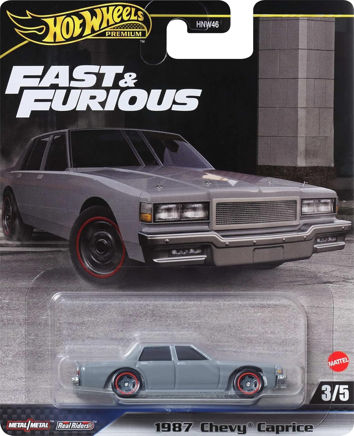 Opakowanie z modelem samochodu Hot Wheels Premium z serii Fast & Furious, przedstawiające szary model 1987 Chevy Caprice. Na opakowaniu widnieje logo Hot Wheels Premium oraz napis \'Fast & Furious\'.