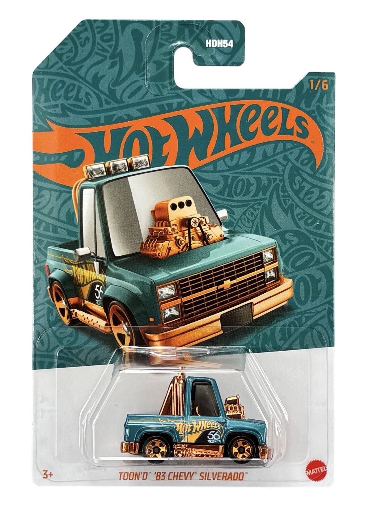 Opakowanie z modelem samochodu Hot Wheels przedstawiające niebieską ciężarówkę z pomarańczowymi elementami. Widoczny tekst: \'TOON\'D \'83 CHEVY SILVERADO\'.