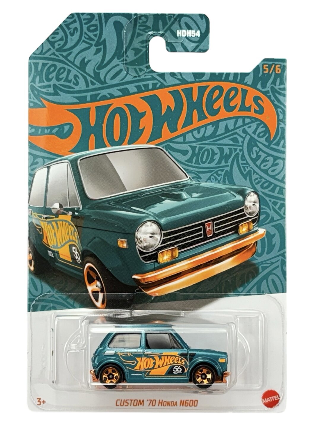 Opakowanie z modelem samochodu Hot Wheels, przedstawiające zielony pojazd Custom \'70 Honda N600 z pomarańczowymi detalami. Na opakowaniu widnieje napis \'Hot Wheels\' oraz logo \'Mattel\'.