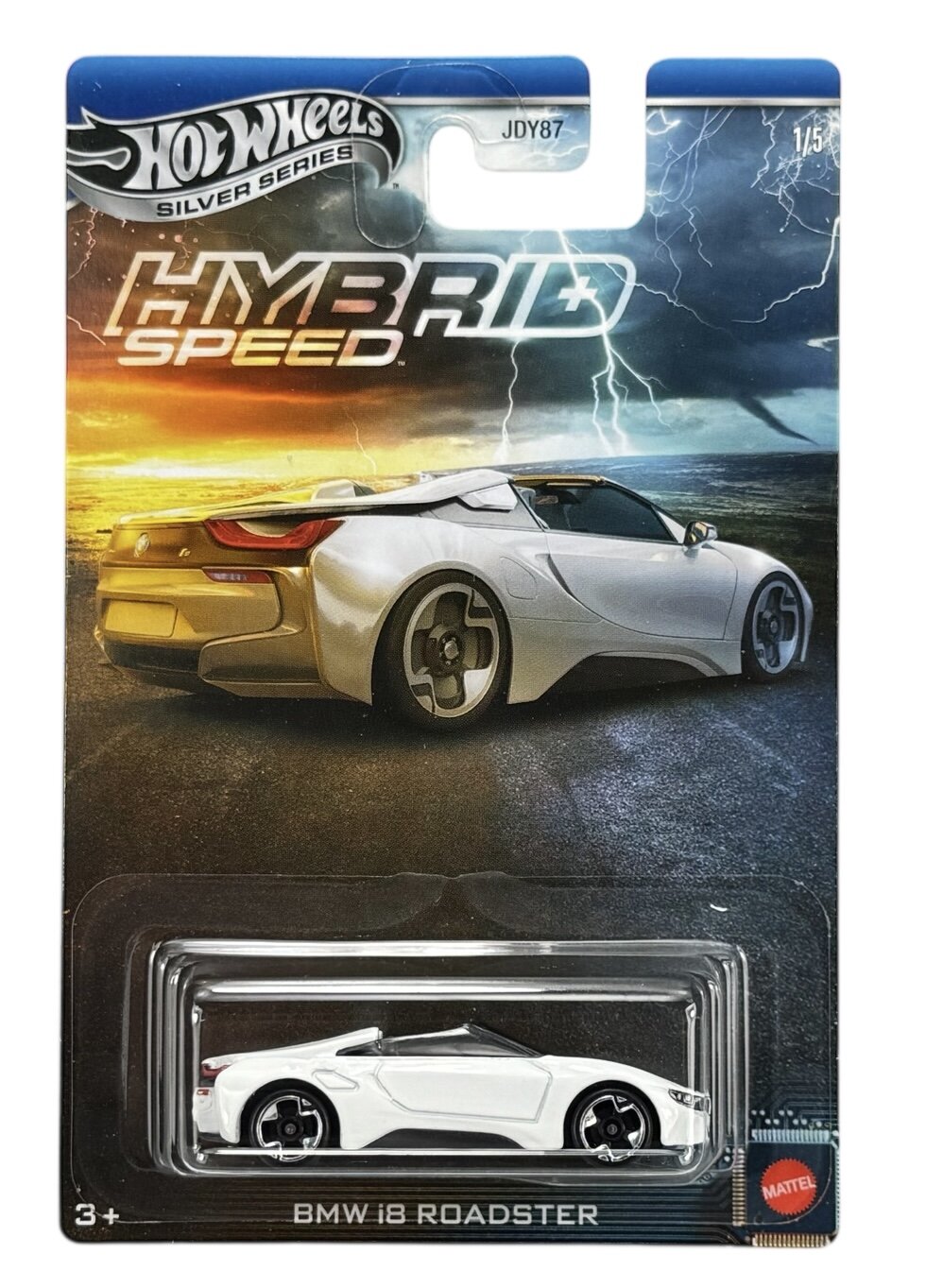 Opakowanie z modelem samochodu Hot Wheels Silver Series JDY87, przedstawiające biały samochód BMW i8 Roadster. Na opakowaniu widnieje napis \'HYBRID SPEED\' oraz logo Mattel.