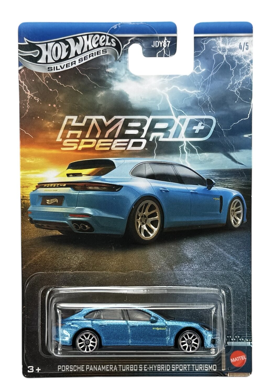 Opakowanie z modelem samochodu Hot Wheels Silver Series, przedstawiające niebieski samochód sportowy na tle burzowego nieba. Na opakowaniu widnieje napis \'HYBRID SPEED\' oraz \'Porsche Panamera Turbo S E-Hybrid Sport Turismo\'.