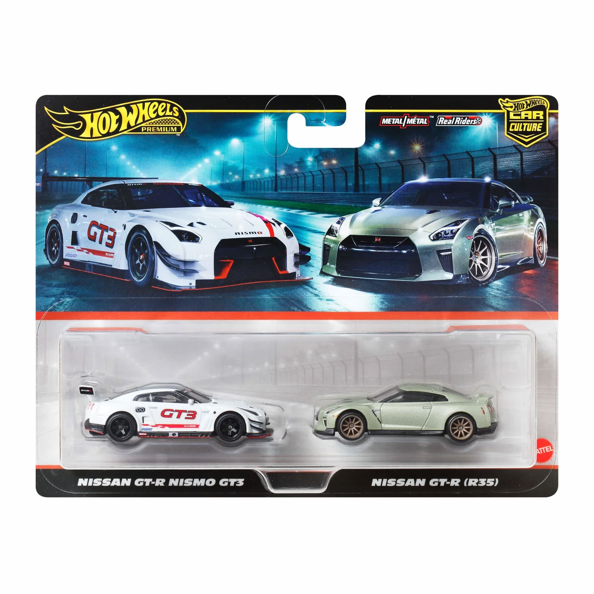 Opakowanie z dwoma modelami samochodów Hot Wheels Premium: Nissan GT-R Nismo GT3 i Nissan GT-R (R35) w skali 1:64. Na górze opakowania widnieje logo Hot Wheels oraz ilustracja przedstawiająca oba samochody na torze wyścigowym.