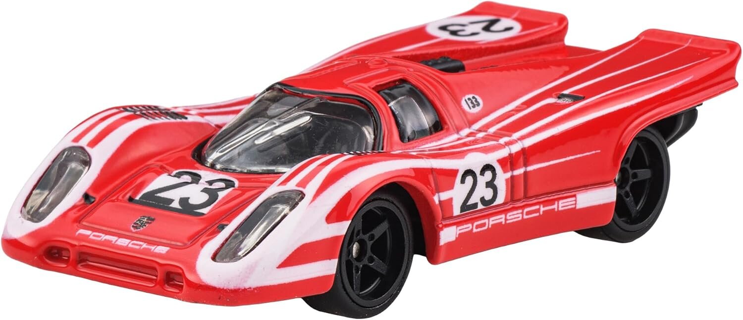 Model samochodu wyścigowego w kolorze czerwonym z białymi pasami i numerem 23 na masce oraz bokach. Na przodzie widoczne jest logo \'Porsche\'.