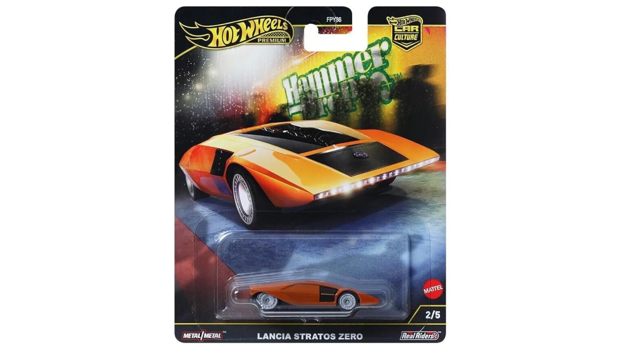 Opakowanie z modelem samochodu Hot Wheels Premium, przedstawiające pomarańczowy pojazd Lancia Stratos Zero. Widoczny tekst: \'Hammer Drops\', \'Lancia Stratos Zero\', \'2/5\', \'Metal/Metal\', \'Real Riders\', \'Mattel\'.