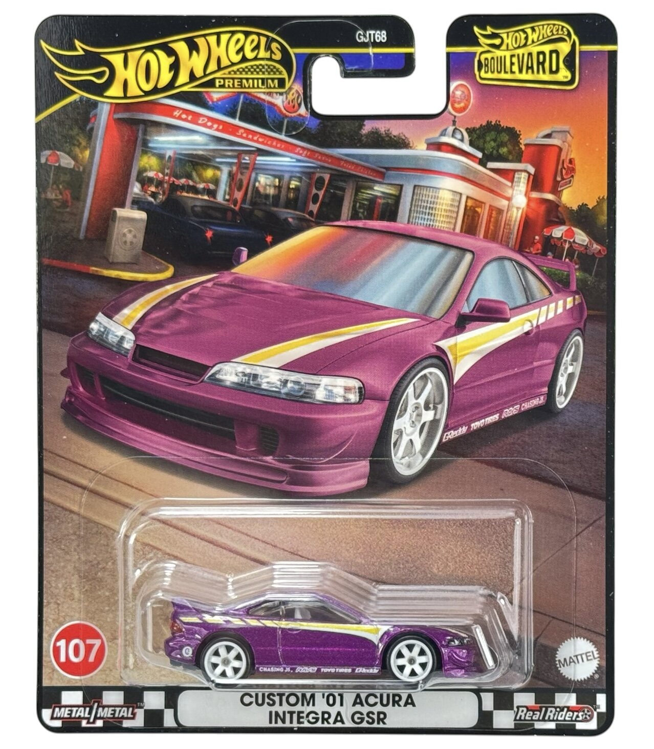 Opakowanie z modelem samochodu Hot Wheels Premium przedstawiające fioletowy samochód Custom \'01 Acura Integra GSR. Widoczne są napisy: \'Hot Wheels Premium\', \'Boulevard\', \'Custom \'01 Acura Integra GSR\', oraz logo Mattel.