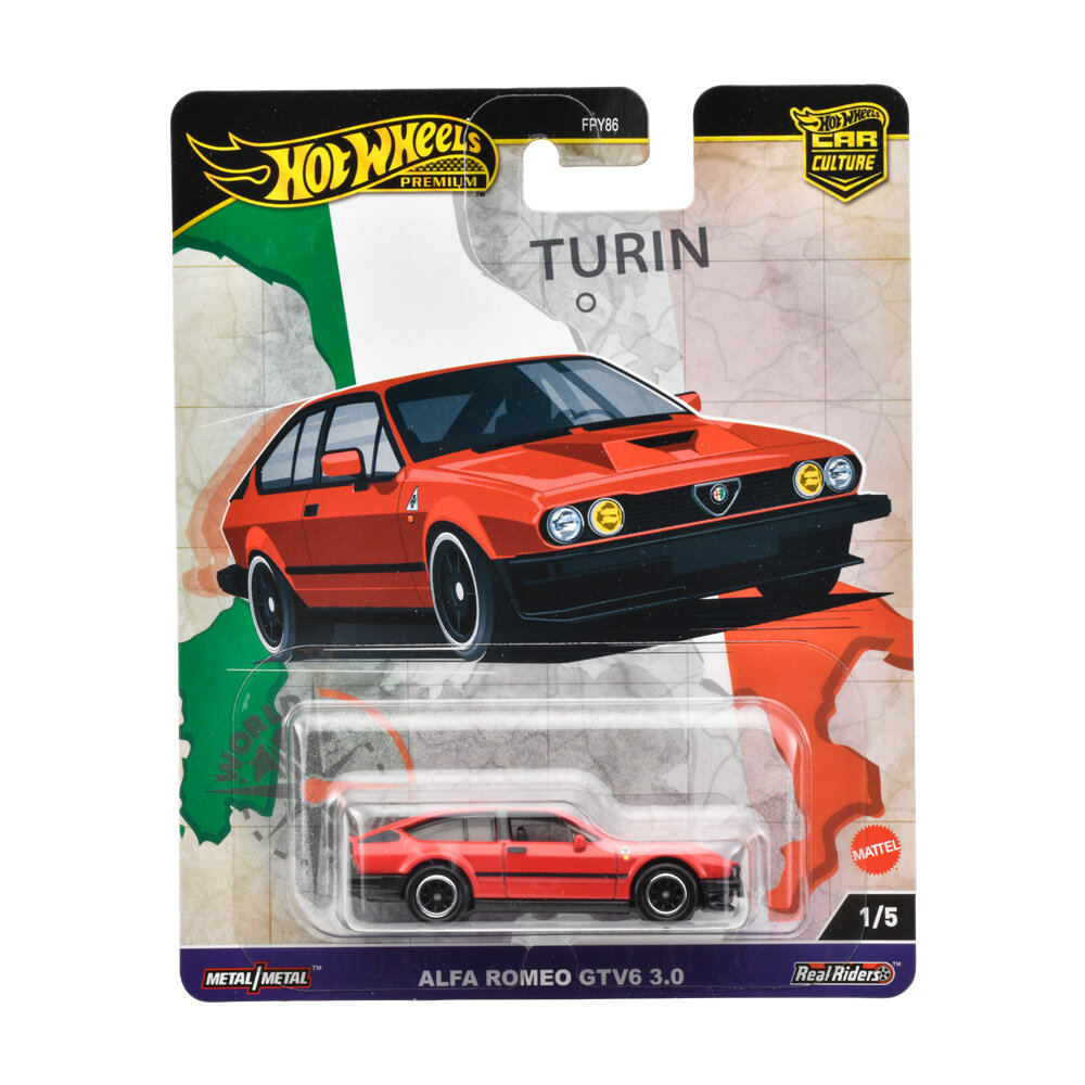 Opakowanie z modelem samochodu Hot Wheels Premium, przedstawiające czerwony samochód Alfa Romeo GTV6 3.0 na tle mapy z napisem \'TURIN\'. Na dole opakowania widnieje napis \'Metal/Metal\' oraz \'Real Riders\'.