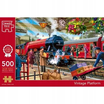 Obraz przedstawia kolorową scenę na stacji kolejowej z czerwonym pociągiem parowym i ludźmi na peronie. Na opakowaniu widnieje napis \'500 Jigsaw Puzzle Vintage Platform\'.