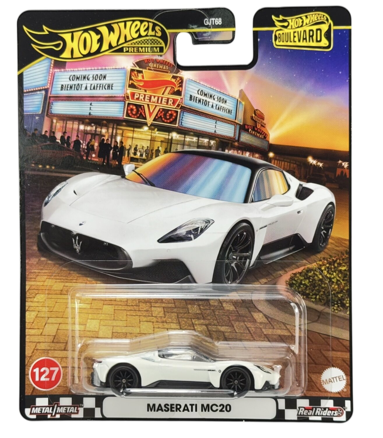 Opakowanie modelu samochodu Hot Wheels Premium z białym Maserati MC20. Na górze widoczne jest logo \'Hot Wheels Boulevard\' oraz napis \'COMING SOON BIENTÔT À L\'AFFICHE\'.