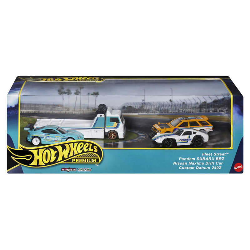 Zestaw Hot Wheels Premium zawiera cztery metalowe modele samochodów, w tym Pandem SUBARU BRZ, Nissan Maxima Drift Car i Custom Datsun 240Z. Opakowanie przedstawia samochody na torze wyścigowym, a na froncie widnieje logo Hot Wheels Premium.